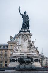 Fototapeta na wymiar Marianne statue, national symbol of the French Republic at Place de la Republique in Paris, France