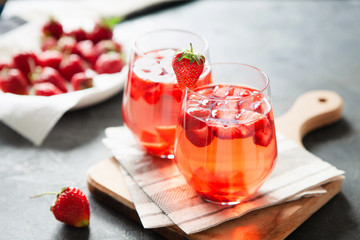 Red strawberry juice with fresh berries