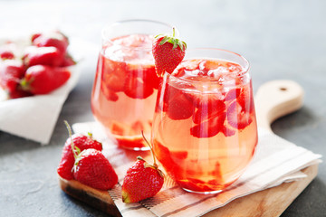Red strawberry juice with fresh berries