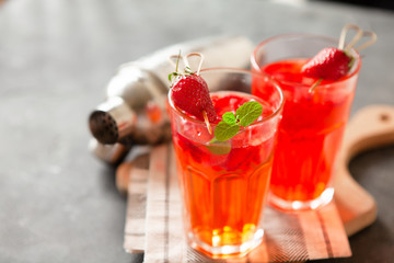 Red strawberry juice with fresh berries