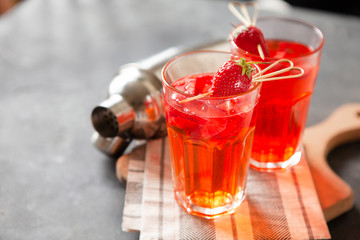 Red strawberry juice with fresh berries