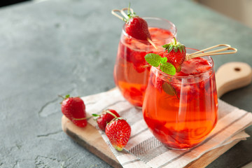 Red strawberry juice with fresh berries