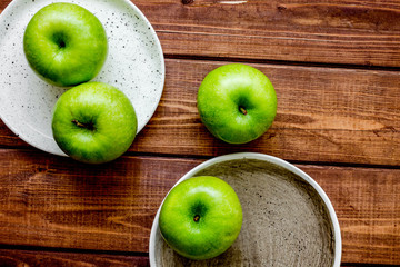 ripe green apples wooden table background top view