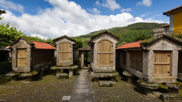 Espigueiro: traditional Espigueiro granaries made of wood used as storehouse for grain to keep the stored food away from mice and other animals.