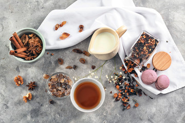 Obraz na płótnie Canvas Flat lay composition with tea, milk and treats on table