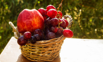 juicy fresh fruit in the basket are on the table