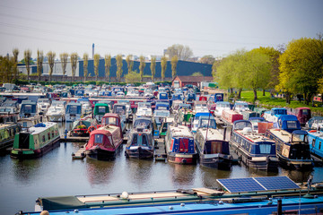 Fototapeta na wymiar Boats on river in Nottingham, England, April in sunny day