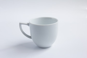 White empty ceramic coffee cup on white background