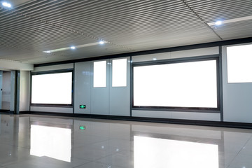 Empty billboards in subway stations