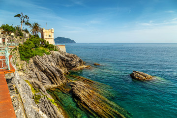Cliffs and a watchtower at the seaside of Nervi, Genoa, Ligurian sea. 