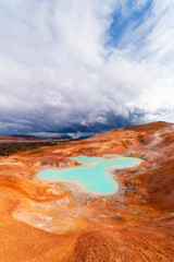 Sulfur springs on the slope of a clay hill in the volcanic region of Iceland