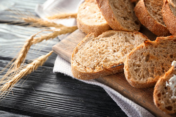 Toasted bread on wooden board