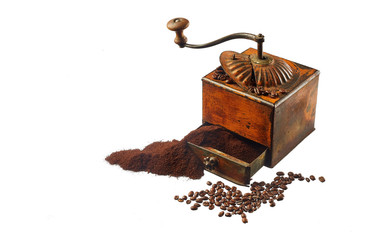 coffee ground and in grains isolated on white background. old coffee grinder.