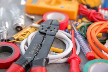 Different electrical tools on table