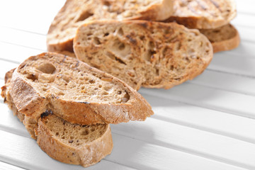Toasted bread on wooden background