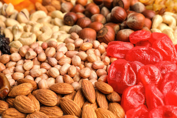 Different nuts and dried berries, closeup