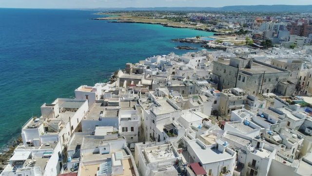 White city Monopoly and blue sea coastline in Italy Drone flight 4k