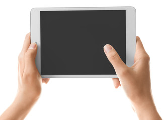 Young woman holding tablet computer on white background