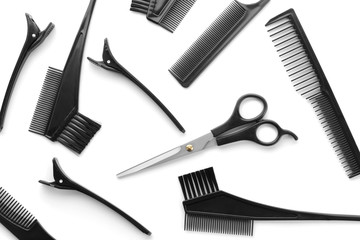 Professional hairdresser's set on white background, top view