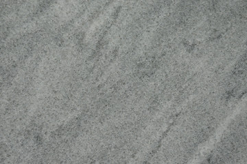 Fototapeta na wymiar texture of a smooth marble slab in gray