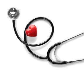 Medical stethoscope with heart on white background. Health care concept