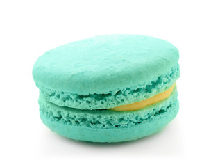 Delicious blue macaron on white background