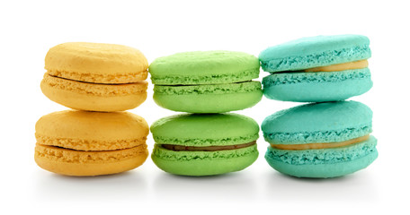 Delicious colorful macarons on white background