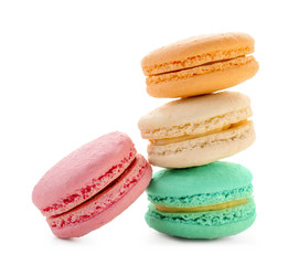 Delicious colorful macarons on white background