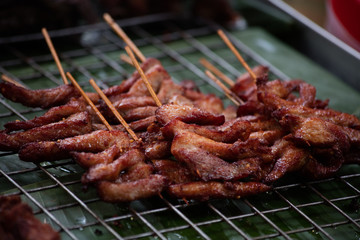 grilled pork skewers sold in the streets, thailand