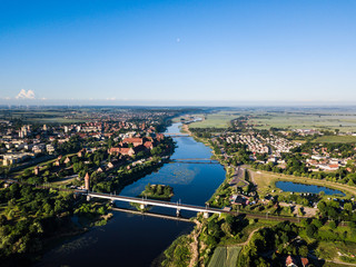 Fototapeta premium Aerial: The Castle of Malbork in Poland, summer time