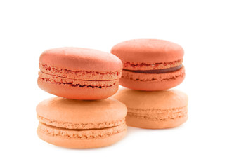 Tasty colorful macarons on white background