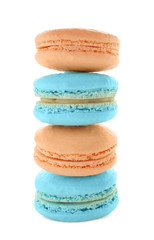 Tasty colorful macarons on white background