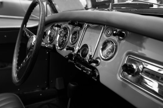 ISRAEL, PETAH TIQWA - MAY 14, 2016:  Exhibition of technical antiques. Steering wheel and dashboard in interior of old retro automobile in Petah Tiqwa, Israel