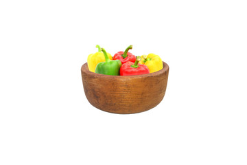 sweet peppers in wood bowl