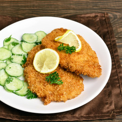 Schnitzel with cucumber salad