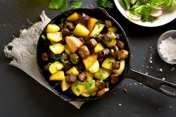 Roasted potatoes with mushroom and sausage