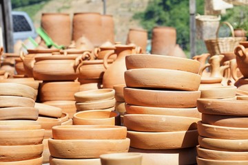 National Georgian souvenirs made of red clay: traditional jugs and pans «ketsi» («kezi»), Georgia (Europe), Caucasus