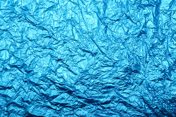 Blue texture of crumpled foil