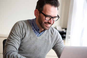 businessman working with laptop computer at home