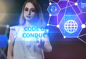 The concept of business, technology, the Internet and the network. A young entrepreneur working on a virtual screen of the future and sees the inscription: Code of conduct