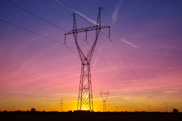 Electric tower on sunset