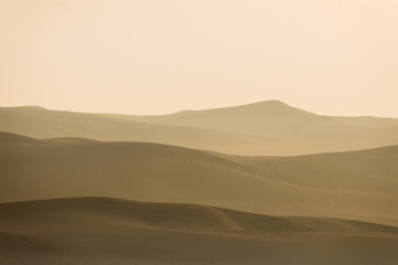 Fototapeta na wymiar Morning rising sun in desert