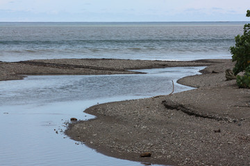 La Playa Tambor sandy beach line with blue ocean 