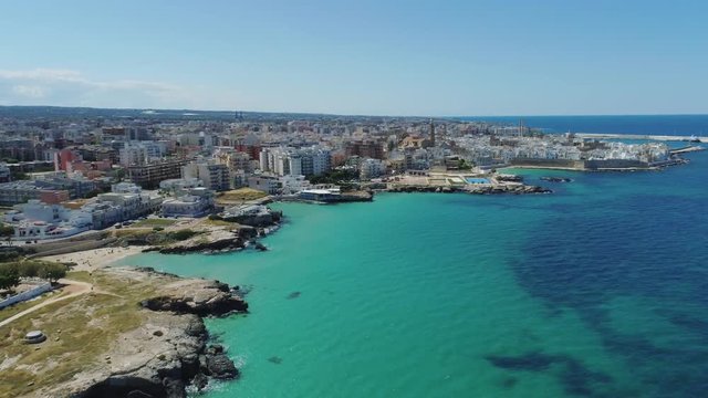 White city Monopoly and blue sea coastline in Italy Drone flight 4k