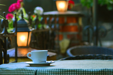 Evening cup of coffee in Italian restaurant