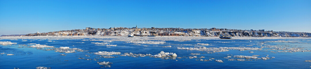 Levis City skyline panorama in winter. Levis is located on the south bank of St. Lawrence River,...