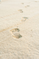 footprints on white sand