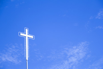 The white Cross with beautiful Blue sky.
