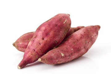 Sweet potatoes isolated on white background
