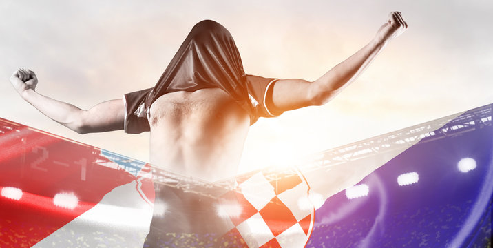 Croatia national team. Double exposure photo of stadium and soccer or football player celebrating goal with his jersey on head